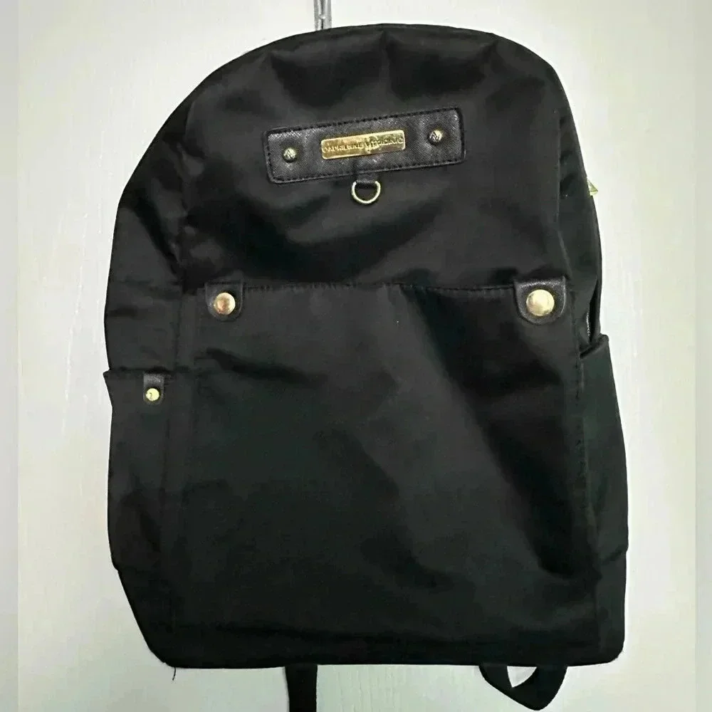 Adrienne Vittadini black nylon backpack and/or diaper bag adjustable straps‎